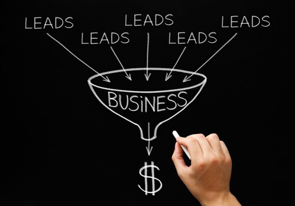Hand drawing a business funnel converting leads into revenue.